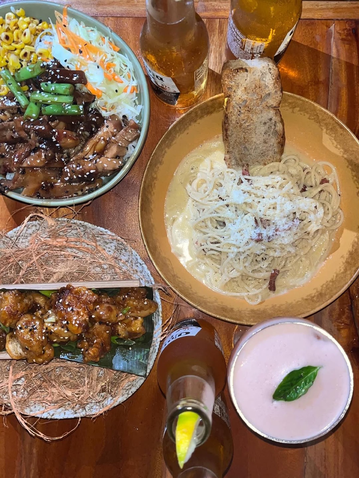 Spread of pasta, rice bowls and cocktails at Mai Tai Siquijor